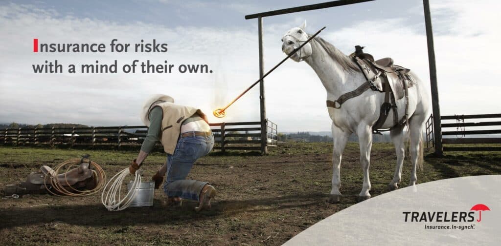 Advertisement of a horse attempting to brand a person.