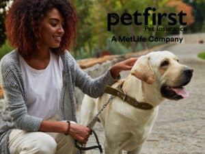 PetFirst Pet Insurance Review featuring a woman petting a dog